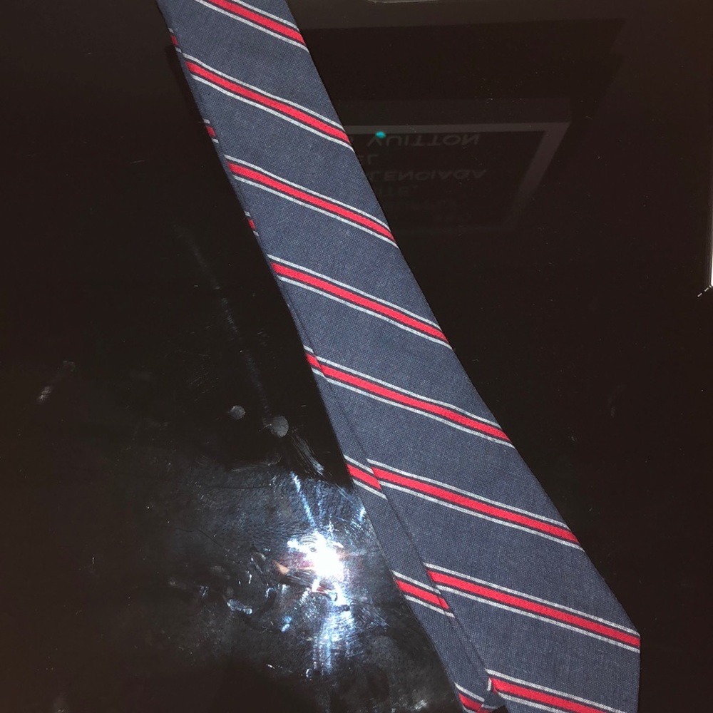 Blue and red striped tie